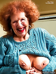 Old Nude Women Pics: 80 Years Old Irish Woman with Big Tits, Sweater and Frizzy Black Hair Laughing